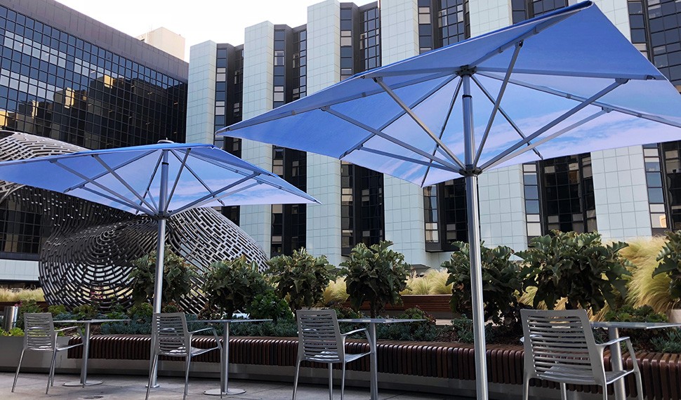 Conceptual artist John Baldessari, a California native, brings his vision of blue skies over the ocean to the shade umbrellas in the Healing Gardens.