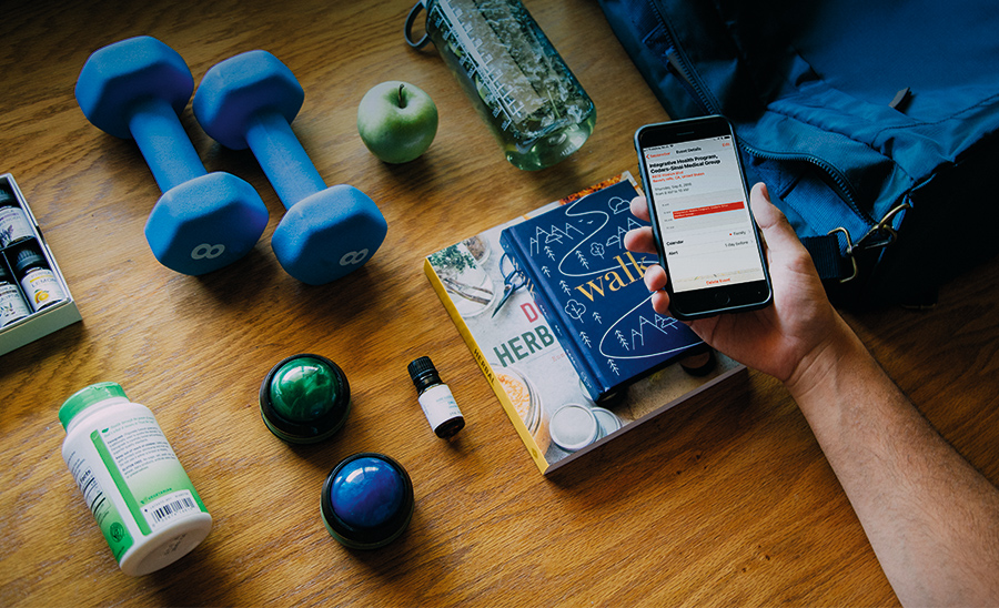 Hand holding an iphone.