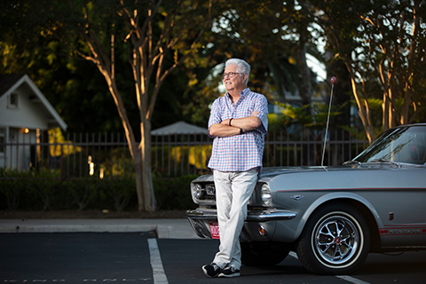Paul Giordano standing next to his classic car.